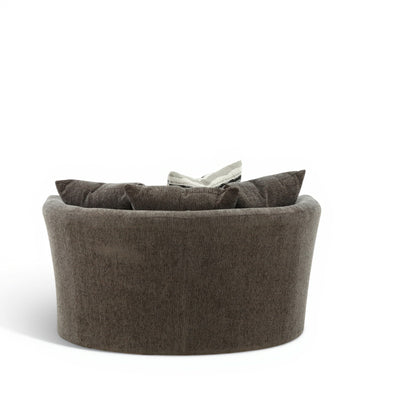 Dark gray round upholstered armchair with back cushions and striped pillow