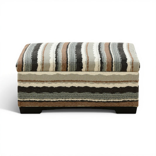 Striped storage ottoman with hinged lift-top and dark wooden legs, beige and charcoal fabric.