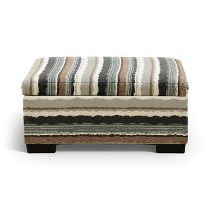Striped storage ottoman with hinged lid closed and dark wooden legs, beige and black stripes.