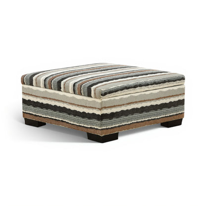 Striped storage ottoman with rectangular upholstered top and dark base legs.