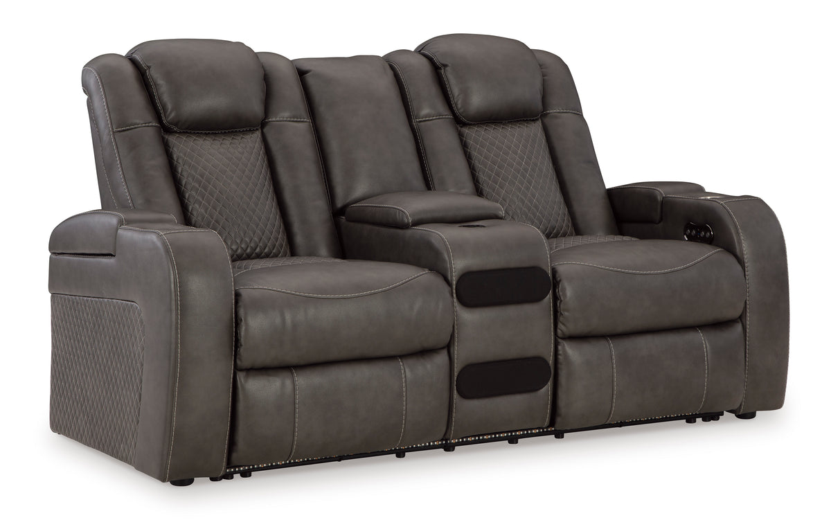 Dark gray dual power reclining loveseat with console, reclined seat positions
