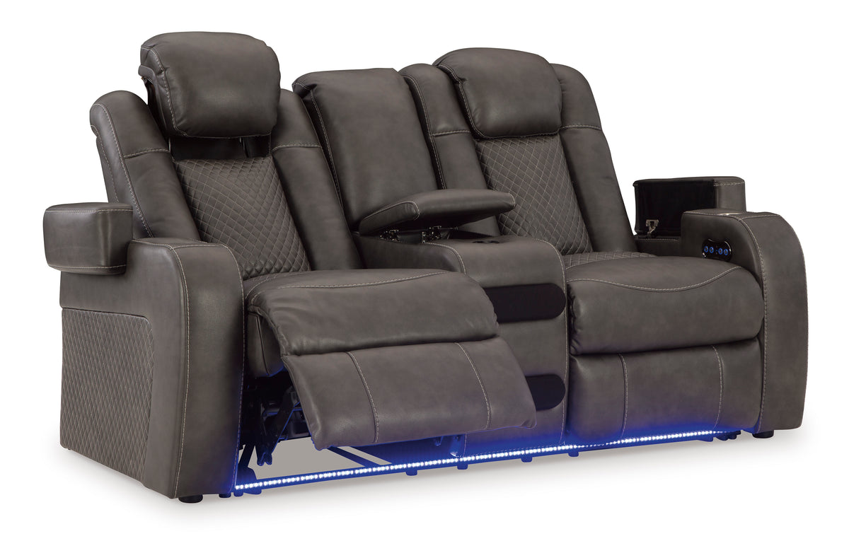 Dark gray dual power reclining loveseat with console, extended leg support and blue LED lights
