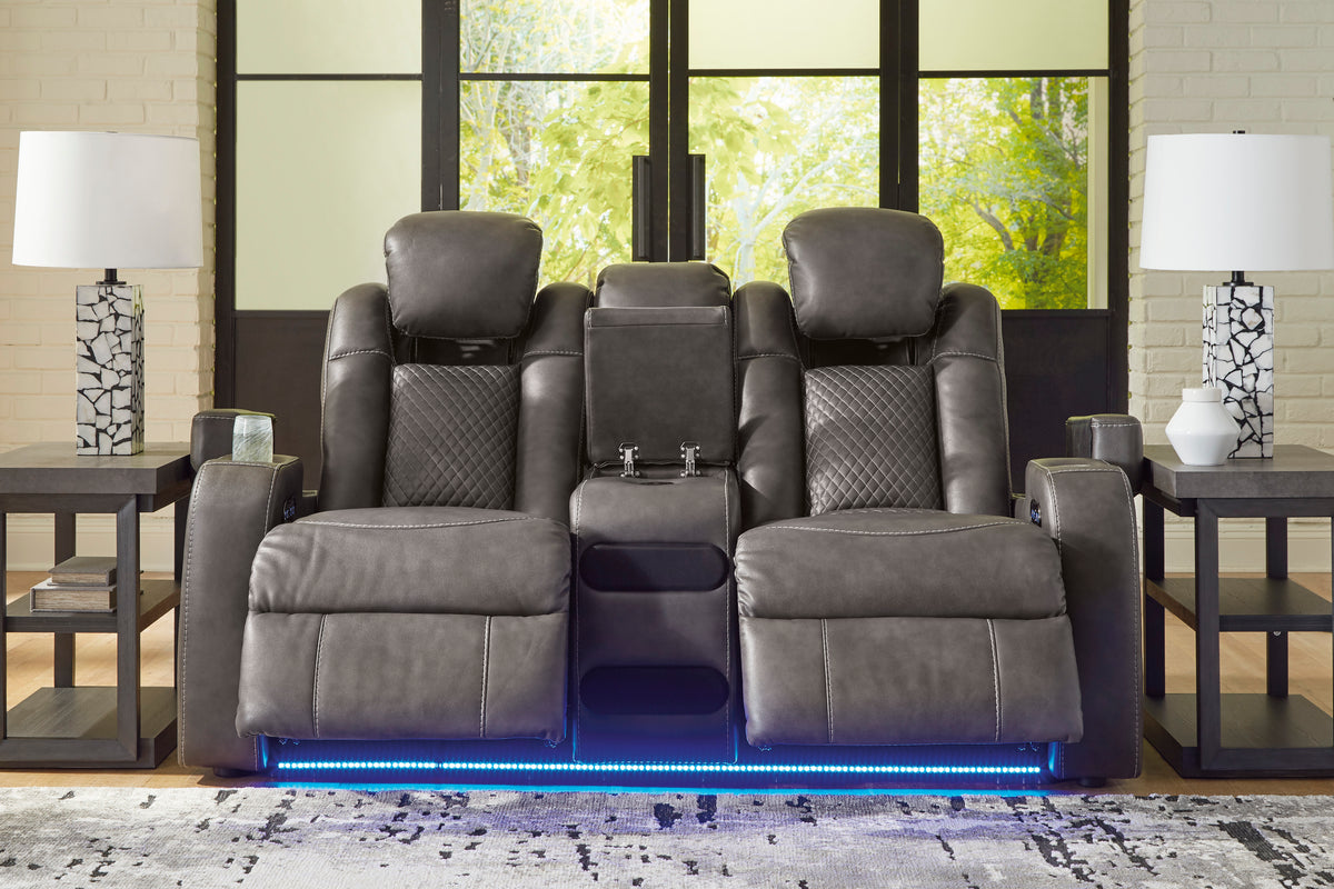 Dark gray dual power reclining loveseat with console and blue LED base strip
