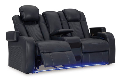 Dark power reclining loveseat with blue LED base, side view