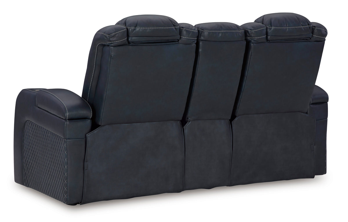Black dual power reclining loveseat with console, back angle