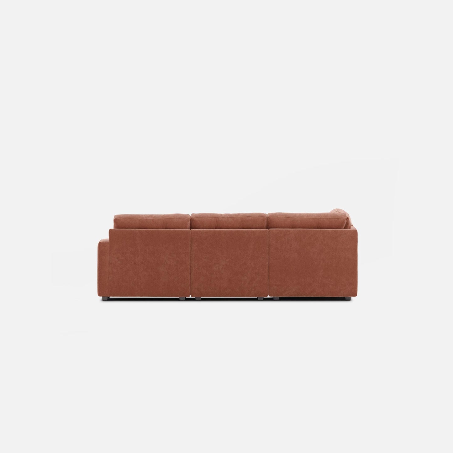 Brown modular sectional sofa with three seat cushions and low backrest.