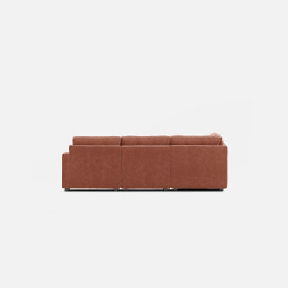 Brown modular sectional sofa with three seat cushions and low backrest.