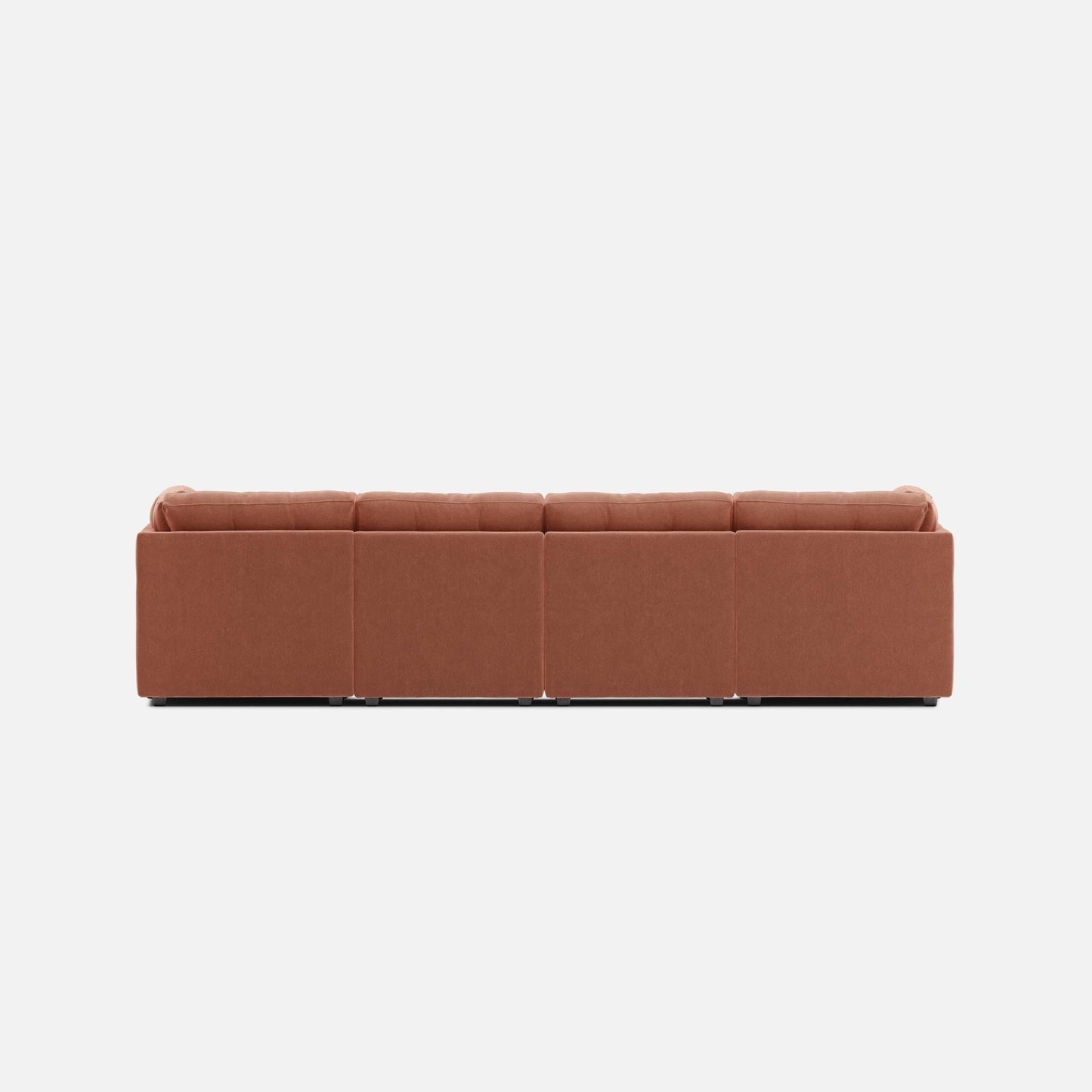 Terracotta modular sectional sofa with clean-lined seat and back cushions