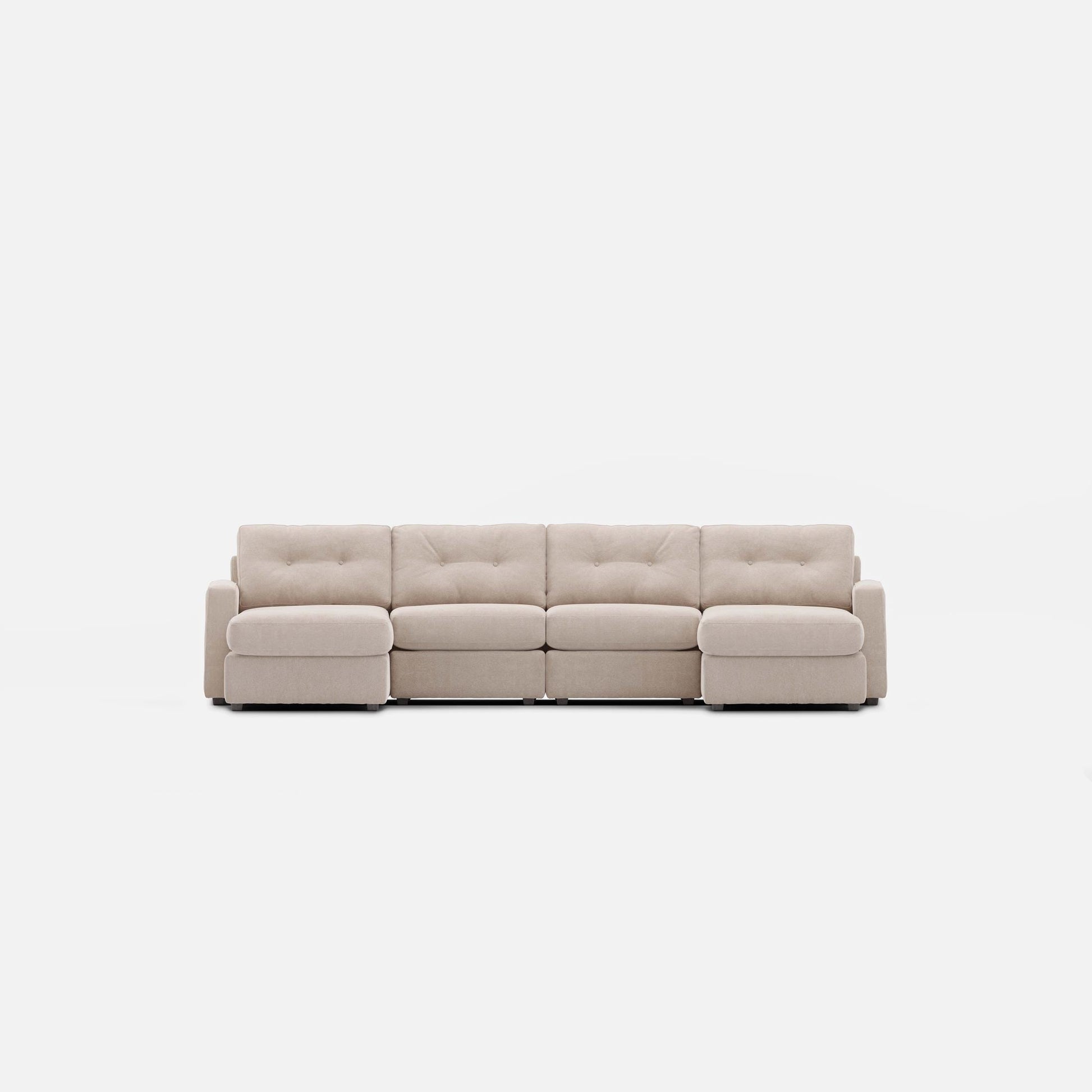 Stone sectional sofa with two chaise lounges, padded arms, and tufted back cushions