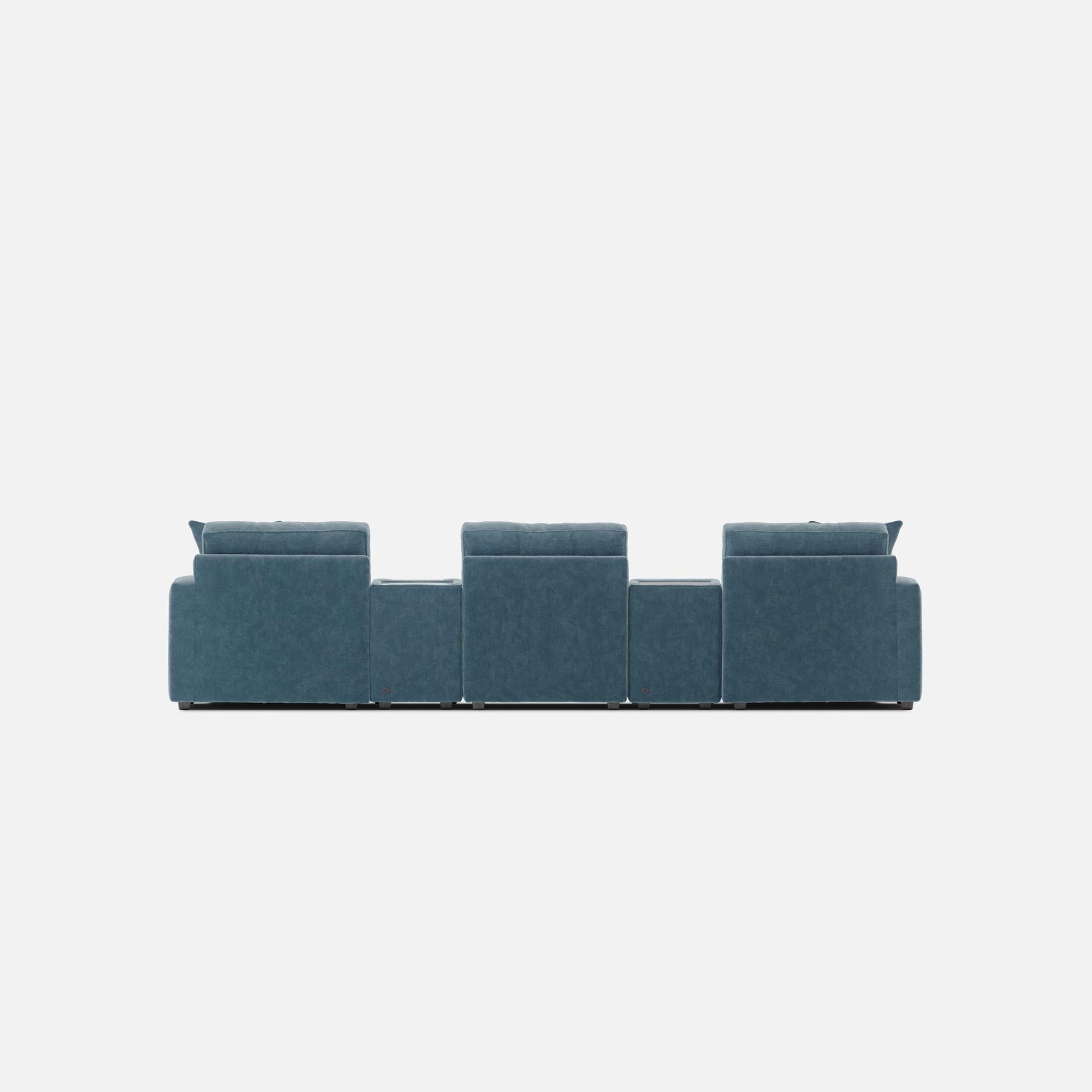 Teal theater sectional sofa with dual chaise and tall tufted back cushions.