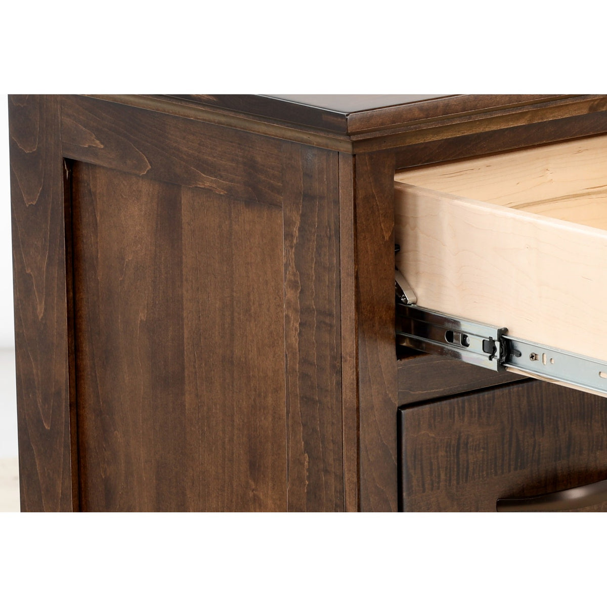 Wood dresser close-up of open slide hardware and metal brackets