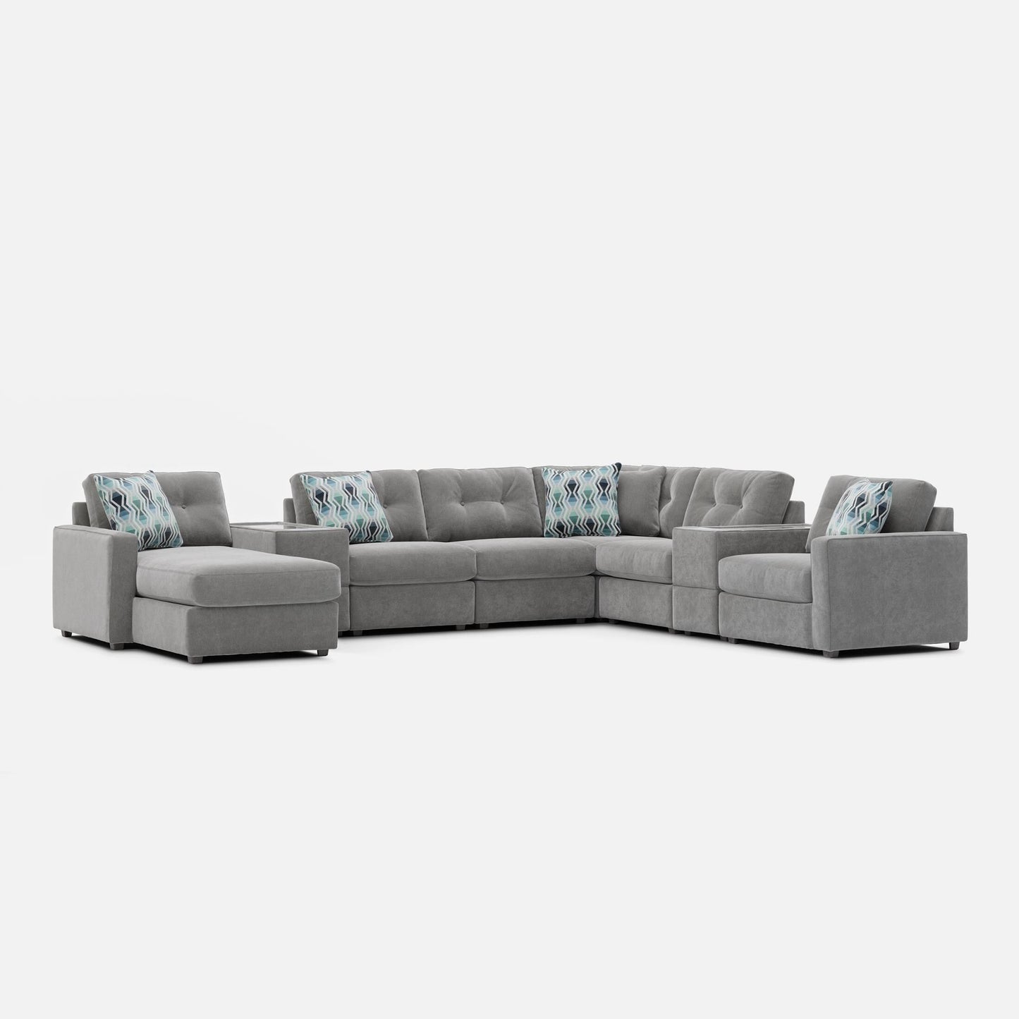 Light gray modular sectional sofa with patterned accent pillows on backrest