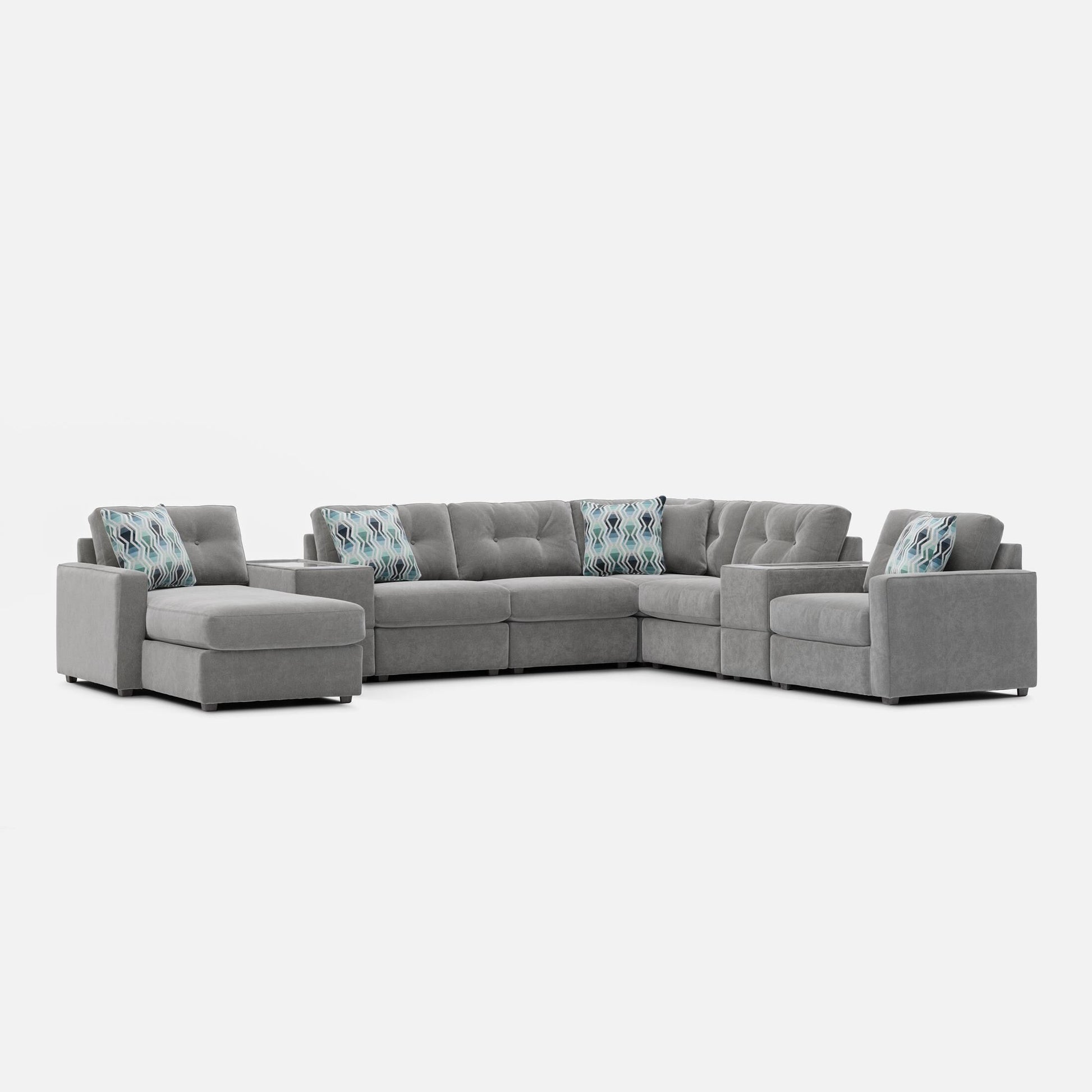 Light gray modular sectional sofa with patterned accent pillows on backrest