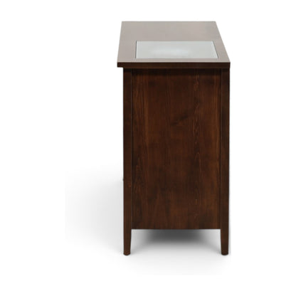 Wood tall cabinet with a light top panel and solid front door.