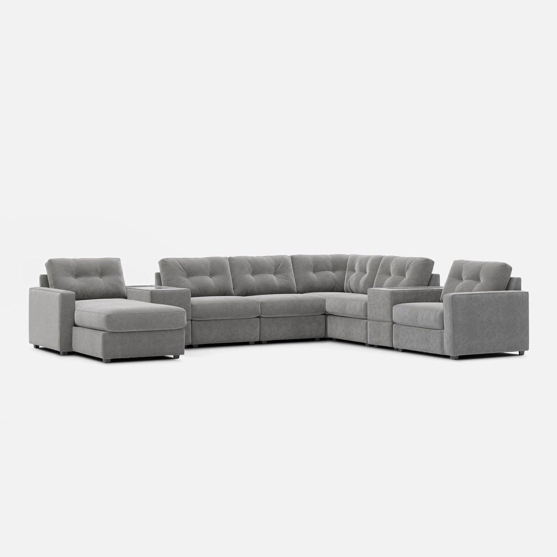 Light gray modular sectional sofa with tufted back cushions and square arms