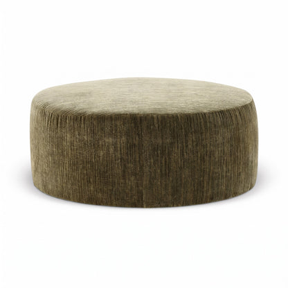 Round accent ottoman in olive green woven fabric, low profile