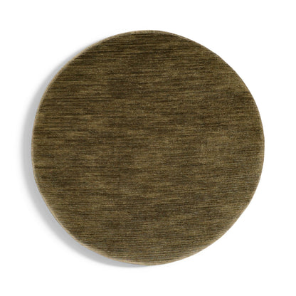 Top view of round accent ottoman in olive green woven upholstery