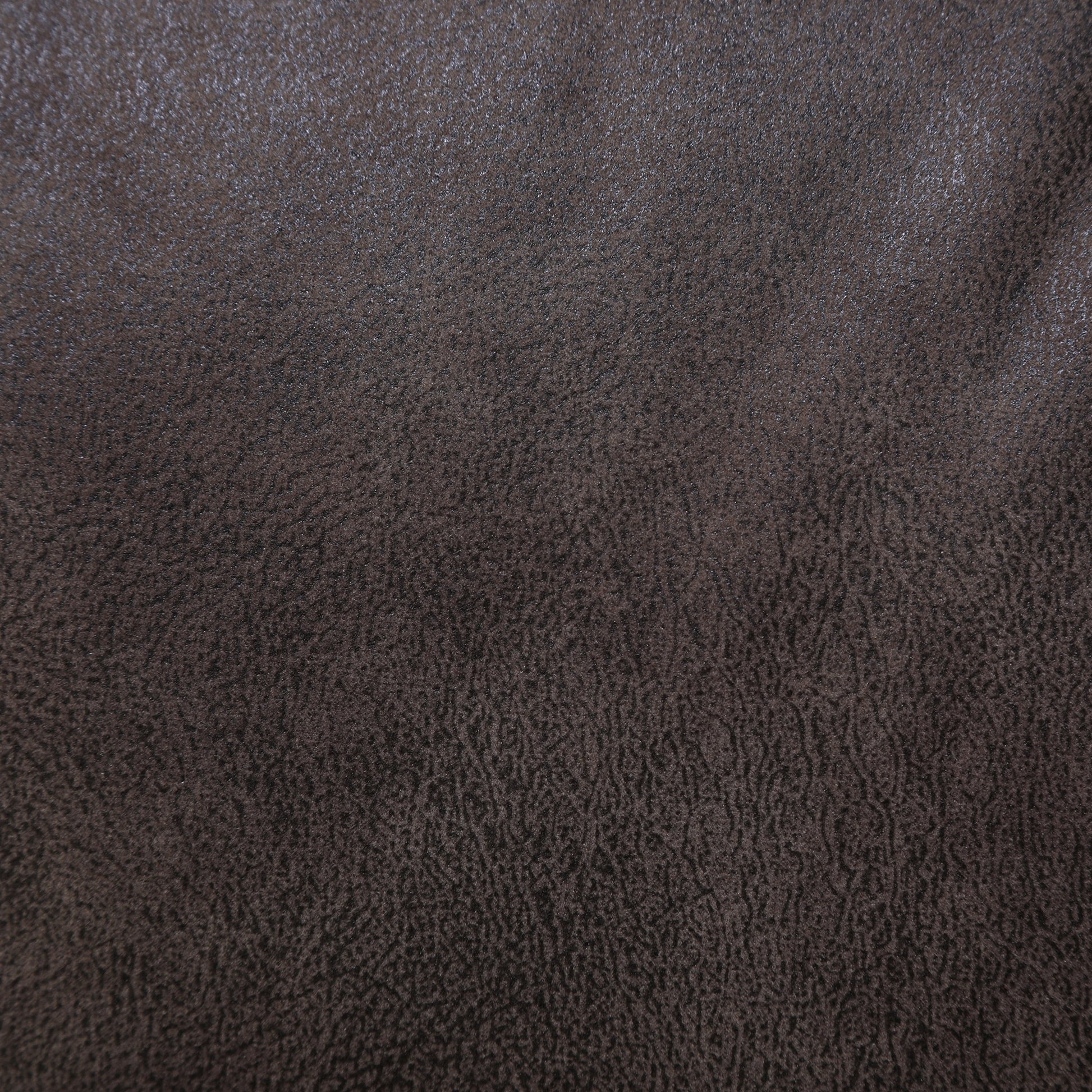 Wall-hugging power recliner faux leather fabric texture in dark brown