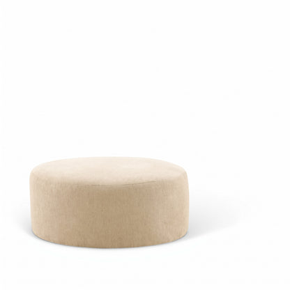 Beige upholstered round accent ottoman with smooth top and flat sides