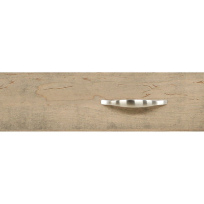 Wood dresser drawer pull with brushed metal handle on front panel