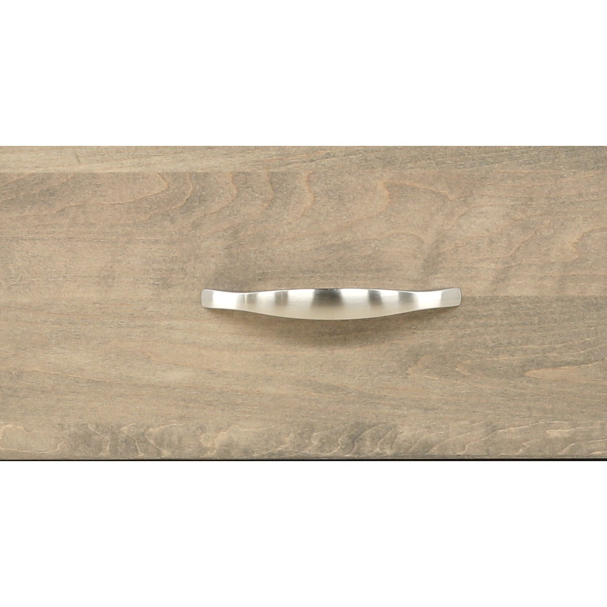 Curved metal drawer handle centered on light wood nightstand front