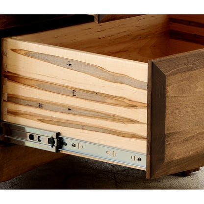 Wood nightstand drawer interior with metal slide rails and brackets
