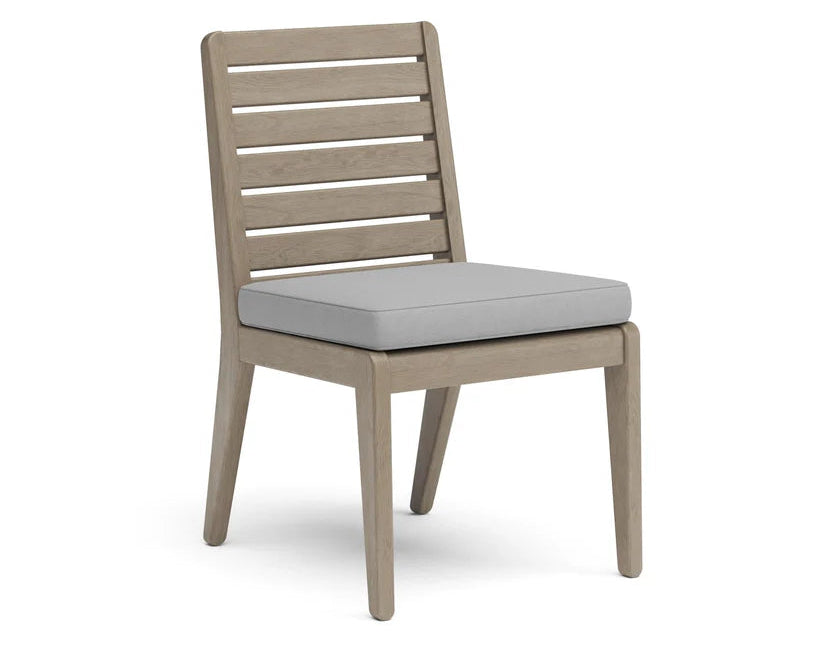 Beige outdoor chair with a gray cushion on a white background