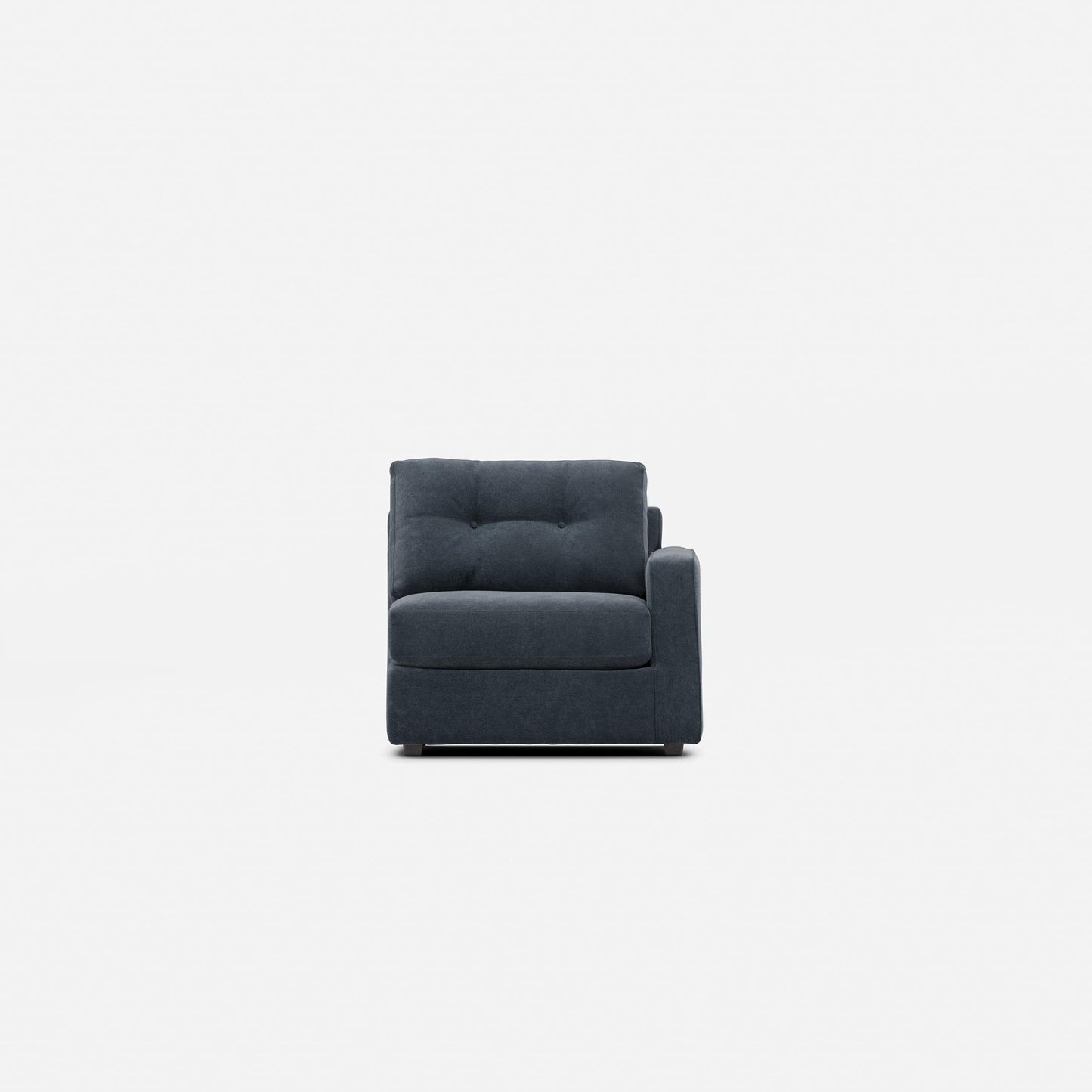 Upholstered armchair in dark navy with tufted back cushion and square armrests