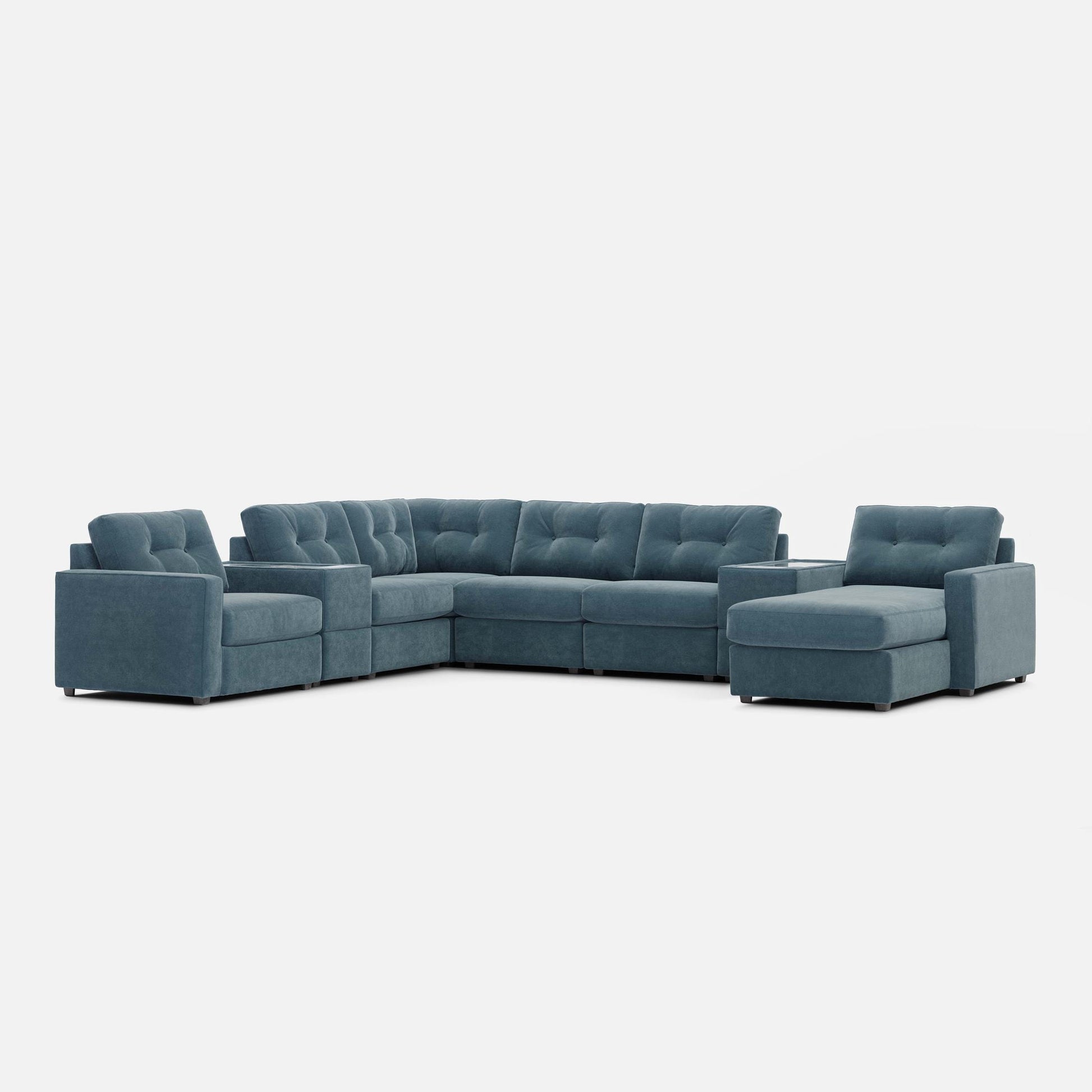 Teal blue corner sectional sofa with square seat blocks and chaise ottomans