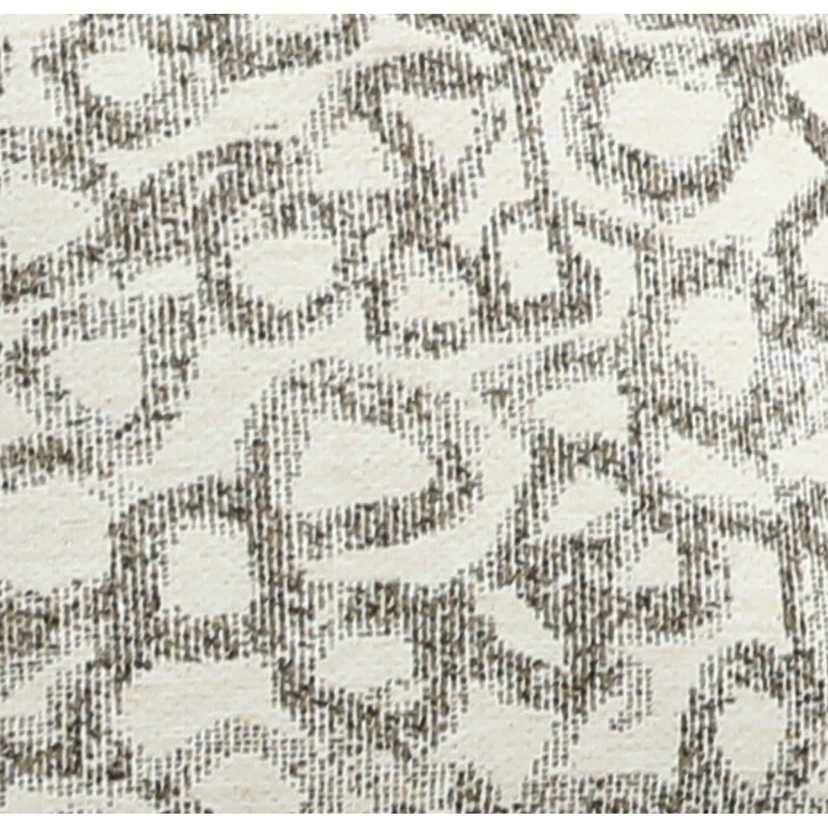 Close-up of woven light-beige and dark patterned fabric for accent pillow cover