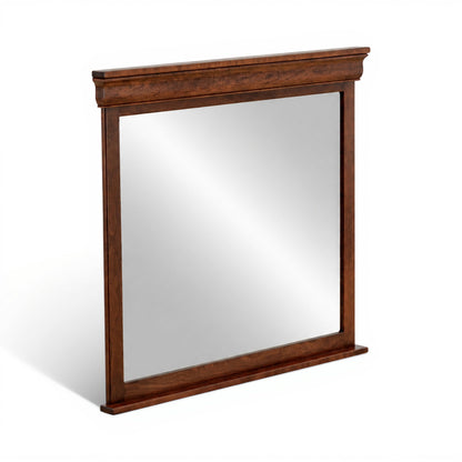 Freestanding beveled bedroom mirror with dark wood frame