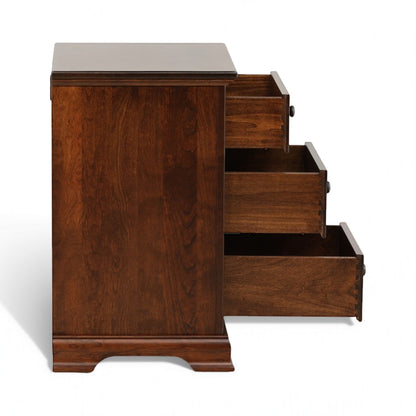 Brown wood nightstand with side drawers open to show inner storage