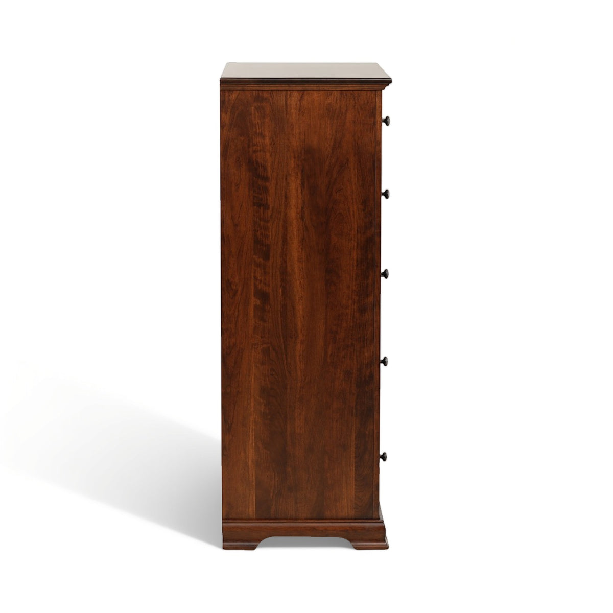 Tall wooden chest of drawers with turned feet and metal hardware