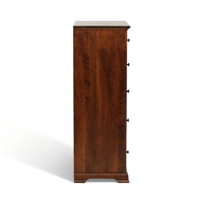 Tall wooden chest of drawers with turned feet and metal hardware