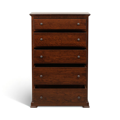 Wooden chest of drawers with four lower drawers and round metal knobs