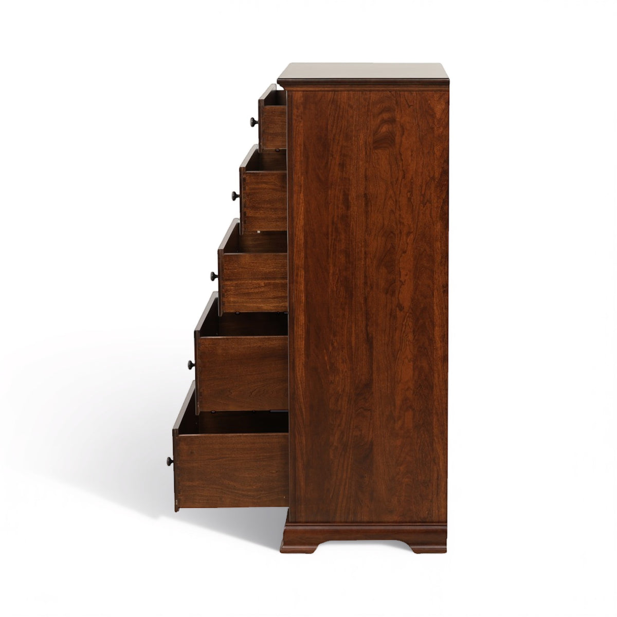 Wooden chest of drawers with several drawers pulled out on the side