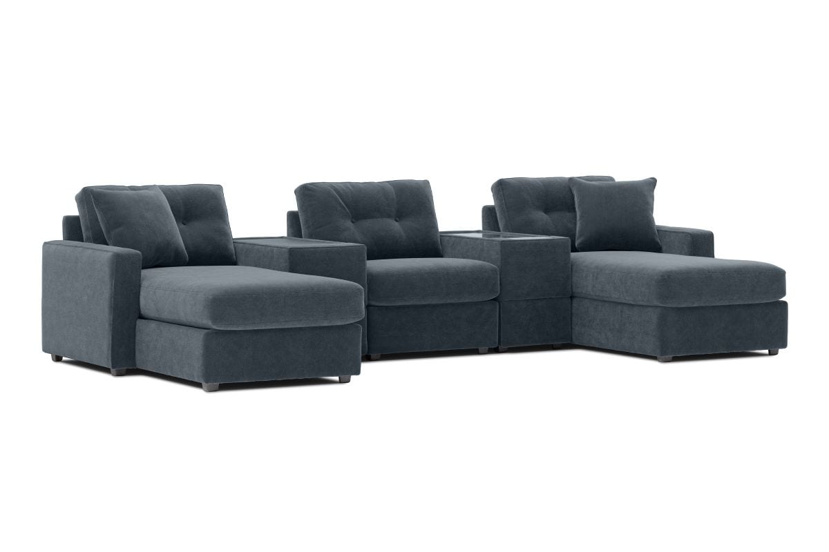 Modular theater sectional with dual chaises, dark navy fabric, angled view of chaise seats.