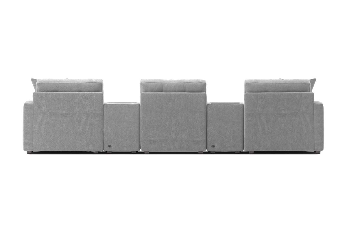 Modular theater sectional with dual chaises, light gray upholstery, front row of back panels.