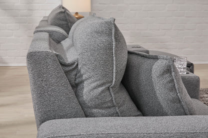 Gray recliner chaise section with thick cushions and padded armrests