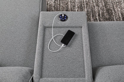 Gray reclining console with built-in charging module and phone on side panel