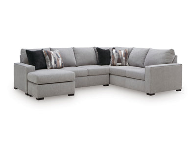 Gray fabric sectional sofa with chaise and dark accent pillows