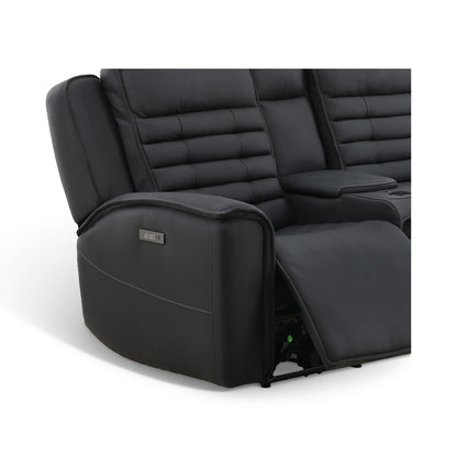 Black leather loveseat close-up of side bolster, console armrest, and recline footrest