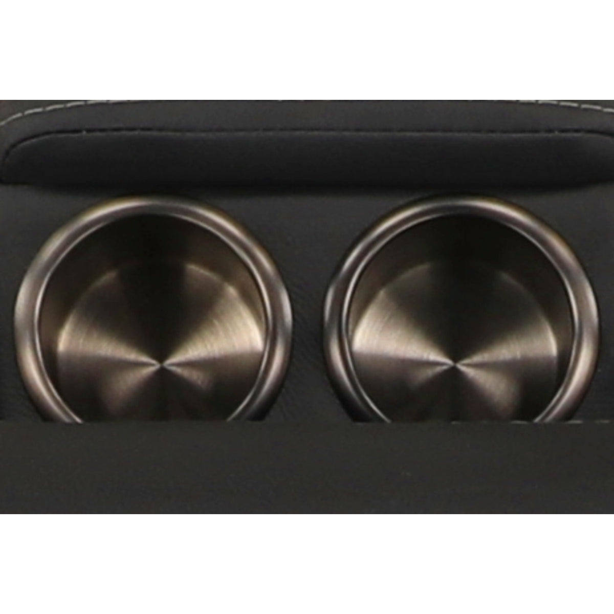 Close-up of two circular cup holders with metal trim on black console loveseat.