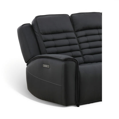 Black leather power reclining sofa close-up of armrest control panel and quilted back stitching.