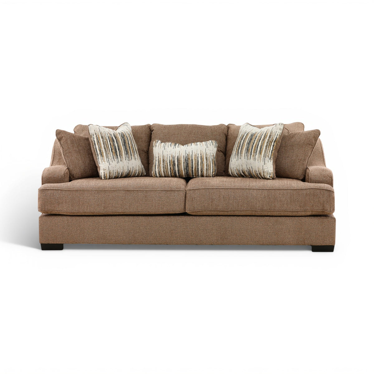 Brown fabric sofa with three seat cushions and three striped accent pillows