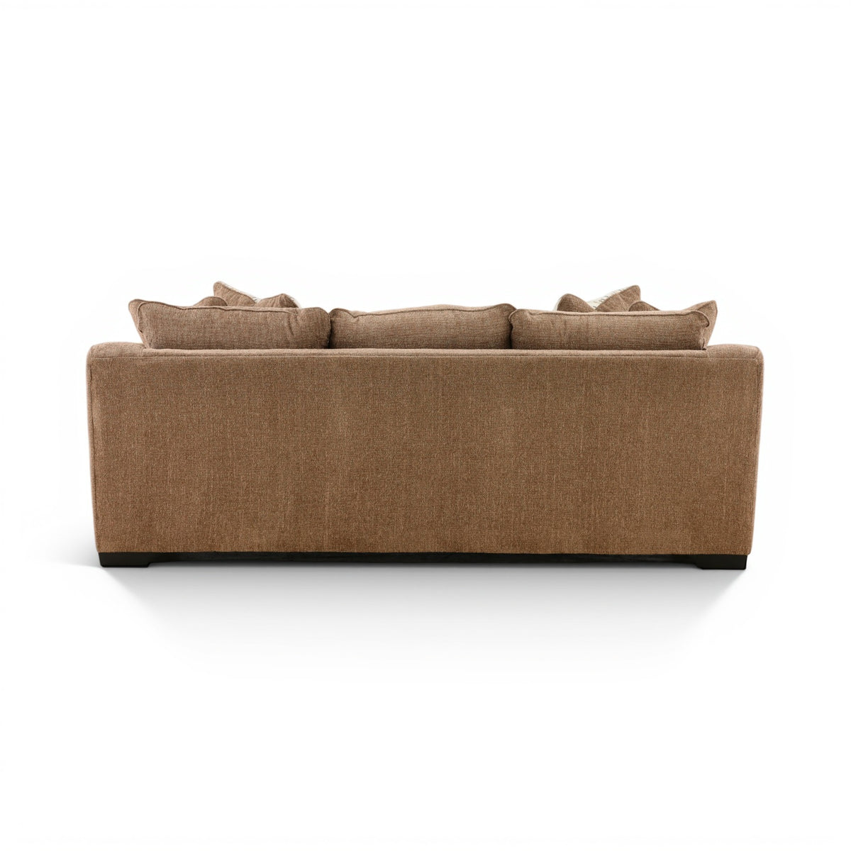 Brown fabric sofa with three seat back cushions and neatly arranged pillows