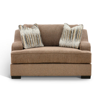 Two-cushion accent chair in brown fabric with two vertical-stripe throw pillows