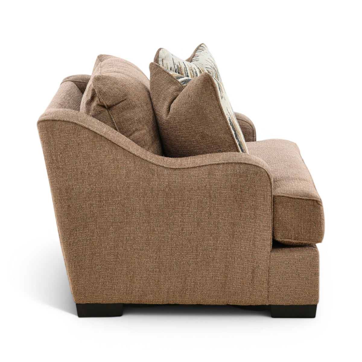 Brown upholstered accent chair with curved arms and two striped accent pillows