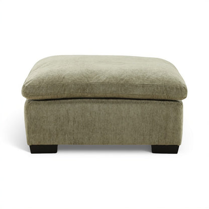Light green ottoman with rounded top, smooth upholstery, and black block feet