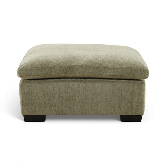Light green ottoman with rounded top, smooth upholstery, and black block feet